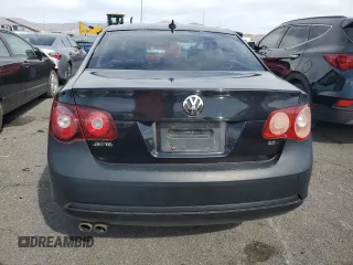 2010 Volkswagen Jetta Wolfsburg Edition with VIN 3VWRJ7AJ1AM050728, listed as a Copart auction lot 49259105 with 161,034 mi miles and Salvage title. Bid and sale history available at DreamBid. Image 6.