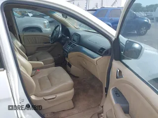 2007 Honda Odyssey EX-L with VIN 5FNRL38787B051582, listed as a IAAI auction lot 42104718 with 193,630 mi miles and . Bid and sale history available at DreamBid. Image 5.