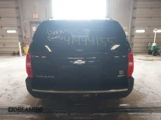 2010 Chevrolet Suburban LTZ with VIN 1GNUKKE39AR106851, listed as a IAAI auction lot 41994155 with 148,776 mi miles. Bid and sale history available at carsss.com. Image 16.