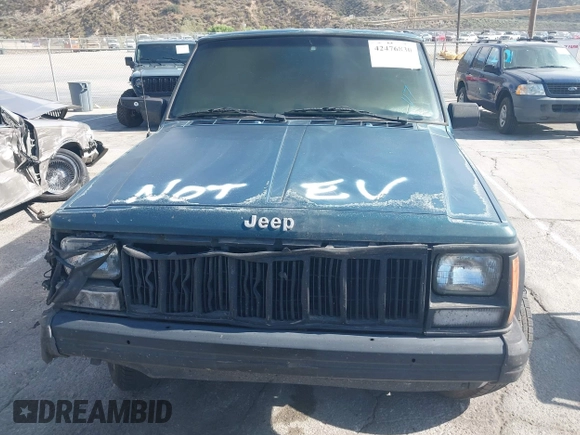 1996 Jeep Cherokee SE with VIN 1J4FT27P4TL309029, listed as a IAAI auction lot 42476830 with Not provided miles and . Bid and sale history available at DreamBid. Image 11.