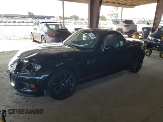 2014 Mazda MX-5 Miata Club z VIN JM1NC2MF0E0235061, wystawiony jako Copart lot #62741565 z przebiegiem 63 767 mil mil oraz Szkoda całkowita • Salvage title. Historia ofert i sprzedaży dostępna na DreamBid. Obrazek 1.