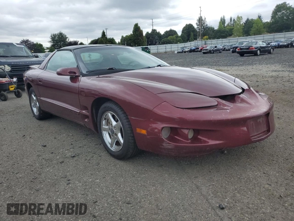 2000 Pontiac Firebird Firebird z VIN 2G2FS22K6Y2143127, wystawiony jako Copart lot #72041384 z przebiegiem 181 787 mil mil oraz Szkoda całkowita • Salvage title. Historia ofert i sprzedaży dostępna na DreamBid. Obrazek 4.