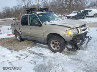 2003 Ford Explorer Sport Trac XLS with VIN 1FMZU77E33UA31967, listed as a IAAI auction lot 41607832 with 144,528 mi miles. Bid and sale history available at carsss.com. Image 1.