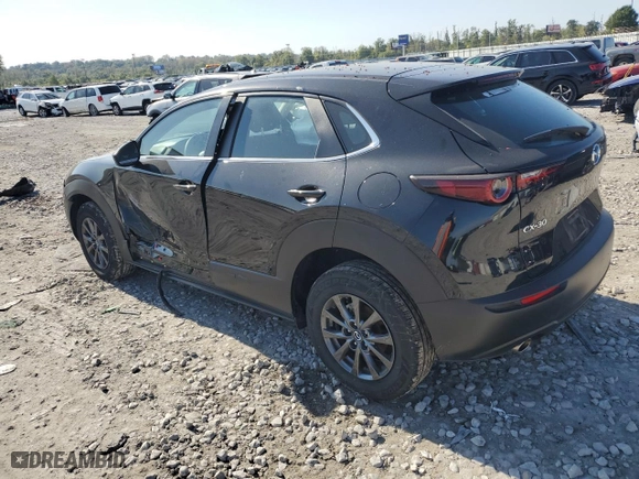 2020 Mazda CX-30 with VIN 3MVDMABLXLM123291, listed as a Copart auction lot 74711804 with 59,248 mi miles and Salvage Title. Bid and sale history available at carsss.com. Image 2.