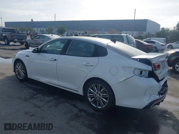 2016 Kia Optima SXL Turbo with VIN 5XXGV4L20GG074869, listed as a IAAI auction lot 41212808 with 82,884 mi miles. Bid and sale history available at carsss.com. Image 3.