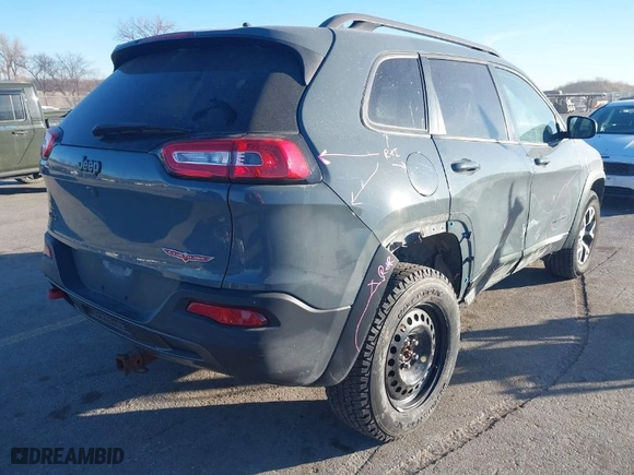 2015 Jeep Cherokee Trailhawk with VIN 1C4PJMBB5FW540094, listed as a IAAI auction lot 41440568 with 191,852 mi miles. Bid and sale history available at carsss.com. Image 4.