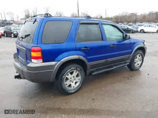 2005 Ford Escape XLT with VIN 1FMYU931X5KA28279, listed as a IAAI auction lot 41861060 with 173,999 mi miles. Bid and sale history available at carsss.com. Image 4.