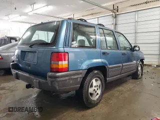 1994 Jeep Grand Cherokee Laredo with VIN 1J4FX58S0RC316030, listed as a Copart auction lot 66178754 with 281,785 mi miles and Salvage Title. Bid and sale history available at carsss.com. Image 3.
