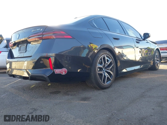 2024 BMW i5 eDrive40 with VIN WBY33FK09RCR42126, listed as a IAAI auction lot 41370577 with 9,601 mi miles and . Bid and sale history available at DreamBid. Image 4.
