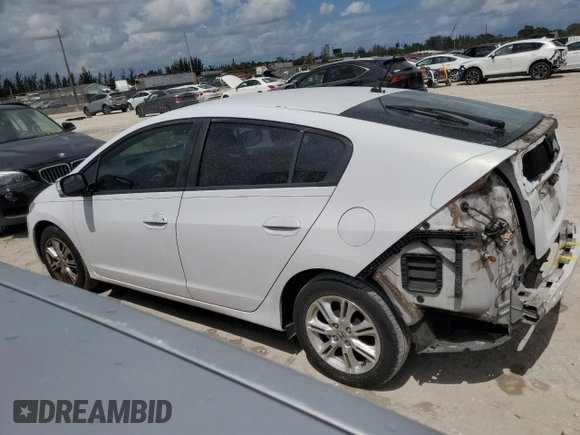 2010 Honda Insight EX with VIN JHMZE2H79AS038112, listed as a Copart auction lot 54794785 with 183,457 mi miles and Salvage Title. Bid and sale history available at DreamBid. Image 2.