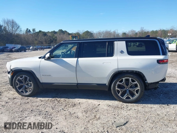 2025 Rivian R1S Adventure with VIN 7PDSGBBA0SN049154, listed as a IAAI auction lot 41160166 with 3,036 mi miles. Bid and sale history available at carsss.com. Image 14.