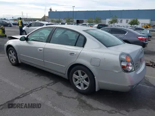 2002 Nissan Altima S with VIN 1N4AL11D62C717139, listed as a IAAI auction lot 41569217 with 135,200 mi miles. Bid and sale history available at carsss.com. Image 3.