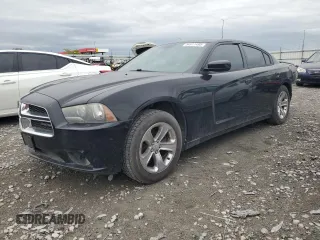 2013 Dodge Charger SXT z VIN 2C3CDXHG6DH525694, wystawiony jako Copart lot #54911495 z przebiegiem 189 992 mil mil oraz Szkoda całkowita • Salvage title. Historia ofert i sprzedaży dostępna na DreamBid. Obrazek 1.