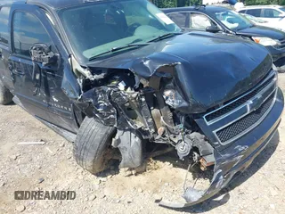 2007 Chevrolet Suburban LTZ with VIN 1GNFK16307J125636, listed as a IAAI auction lot 42622246 with Not provided miles and . Bid and sale history available at DreamBid. Image 6.