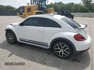 2017 Volkswagen Beetle Dune с VIN 3VWS17AT4HM628723, выставлен на аукционе Copart как лот 54303445 с пробегом 138 254 миль миль и Списание • Salvage title. История ставок и продаж доступна на DreamBid. Изображение 2.