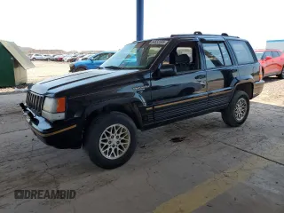1994 Jeep Grand Cherokee Limited z VIN 1J4GZ78S5RC304501, wystawiony jako Copart lot #64632335 z przebiegiem 184 333 mil mil oraz Szkoda całkowita • Salvage title. Historia ofert i sprzedaży dostępna na DreamBid. Obrazek 1.