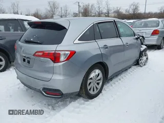 2017 Acura RDX w/Technology Pkg with VIN 5J8TB4H58HL031488, listed as a IAAI auction lot 41274882 with 124,066 mi miles. Bid and sale history available at carsss.com. Image 4.