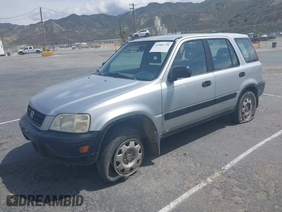 1998 Honda CR-V LX with VIN JHLRD1849WC037776, listed as a IAAI auction lot 41906738 with 265,265 mi miles. Bid and sale history available at carsss.com. Image 2.