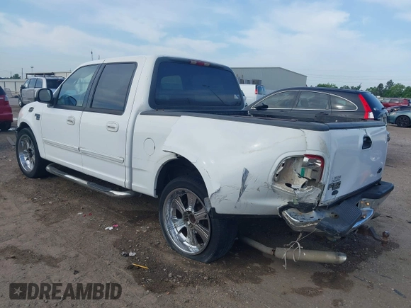2001 Ford F-150 XLT with VIN 1FTRW07L81KE91672, listed as a IAAI auction lot 42021661 with 200,000 mi miles and . Bid and sale history available at DreamBid. Image 3.