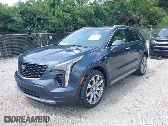 2019 Cadillac XT4 FWD Premium Luxury z VIN 1GYFZCR43KF143980, wystawiony jako IAAI lot #42472400 z przebiegiem 36 496 mil mil oraz . Historia ofert i sprzedaży dostępna na DreamBid. Obrazek 6.