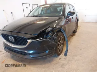 2018 Mazda CX-5 Touring with VIN JM3KFBCM9J0437490, listed as a IAAI auction lot 42006998 with 176,959 mi miles. Bid and sale history available at carsss.com. Image 6.
