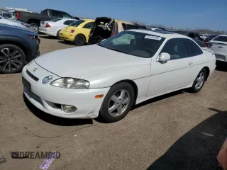 1997 Lexus SC 400 z VIN JT8CH32Y1V1000518, wystawiony jako Copart lot #53190495 z przebiegiem 245 085 mil mil oraz Tytuł czysty. Historia ofert i sprzedaży dostępna na DreamBid. Obrazek 1.