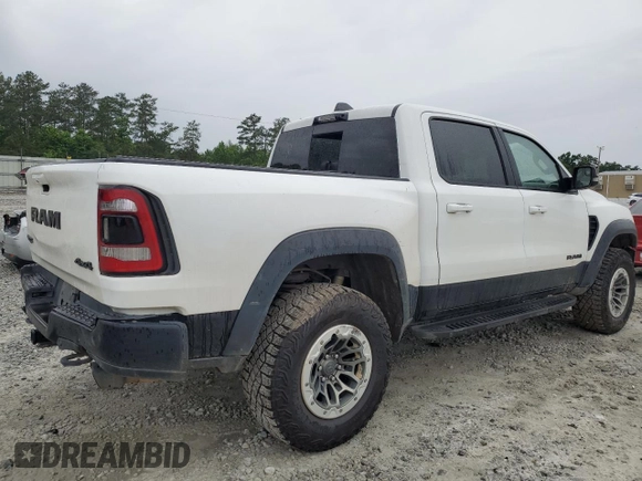 2021 Ram 1500 TRX with VIN 1C6SRFU97MN745516, listed as a Copart auction lot 49011924 with 0 mi miles and Salvage Title. Bid and sale history available at carsss.com. Image 3.