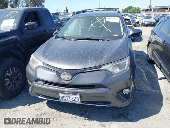 2018 Toyota RAV4 XLE z VIN JTMWFREV4JJ168138, wystawiony jako IAAI lot #41845337 z przebiegiem 122 509 mil mil oraz . Historia ofert i sprzedaży dostępna na DreamBid. Obrazek 13.