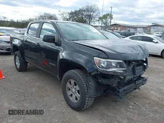 2018 Chevrolet Colorado 2WD Work Truck with VIN 1GCGSBEA8J1297939, listed as a IAAI auction lot 40878510 with 68,009 mi miles and . Bid and sale history available at DreamBid. Image 1.