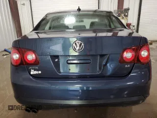 2009 Volkswagen Jetta SE z VIN 3VWRZ71K29M167800, wystawiony jako Copart lot #61451305 z przebiegiem 161 617 mil mil oraz Szkoda całkowita • Salvage title. Historia ofert i sprzedaży dostępna na DreamBid. Obrazek 6.