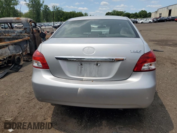 2012 Toyota Yaris z VIN JTDBT4K38C1414236, wystawiony jako Copart lot #58471515 z przebiegiem Nie podano mil oraz Szkoda całkowita • Salvage title. Historia ofert i sprzedaży dostępna na DreamBid. Obrazek 6.