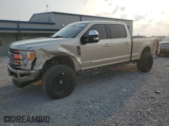 2017 Ford F-250 Lariat with VIN 1FT7W2BT0HEE63562, listed as a Copart auction lot 60880545 with 122,996 mi miles and Salvage title. Bid and sale history available at DreamBid. Image 1.