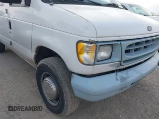 1999 Ford Econoline Cargo Commercial with VIN 1FTNE24L3XHB84868, listed as a IAAI auction lot 41151145 with 450,651 mi miles and . Bid and sale history available at carsss.com. Image 12.