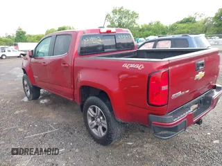 2017 Chevrolet Colorado 4WD LT z VIN 1GCGTCEN5H1227895, wystawiony jako IAAI lot #42384312 z przebiegiem 121 910 mil mil oraz . Historia ofert i sprzedaży dostępna na DreamBid. Obrazek 3.