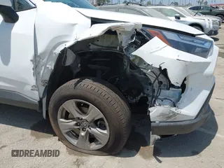 2022 Toyota RAV4 Hybrid XLE with VIN 2T3RWRFV9NW130472, listed as a IAAI auction lot 40990707 with 156,174 mi miles and . Bid and sale history available at DreamBid. Image 6.