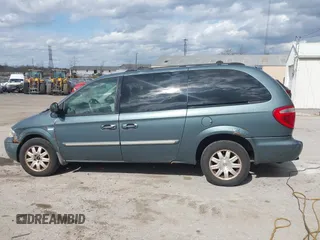 2006 Chrysler Town & Country LWB Touring with VIN 2A4GP54LX6R693048, listed as a IAAI auction lot 41887949 with 187,000 mi miles. Bid and sale history available at carsss.com. Image 14.