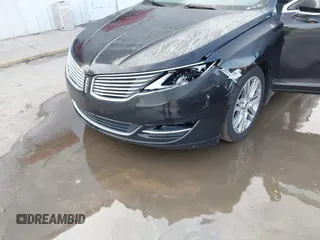 2014 Lincoln MKZ z VIN 3LN6L2G9XER803130, wystawiony jako IAAI lot #42372587 z przebiegiem 84 448 mil mil oraz . Historia ofert i sprzedaży dostępna na DreamBid. Obrazek 6.