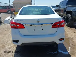 2019 Nissan Sentra S z VIN 3N1AB7AP5KY285776, wystawiony jako IAAI lot #41969976 z przebiegiem 87 187 mil mil oraz . Historia ofert i sprzedaży dostępna na DreamBid. Obrazek 17.