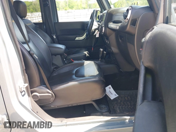 2014 Jeep Wrangler Unlimited Sahara with VIN 1C4BJWEG5EL326980, listed as a IAAI auction lot 42031659 with 116,181 mi miles and . Bid and sale history available at DreamBid. Image 5.