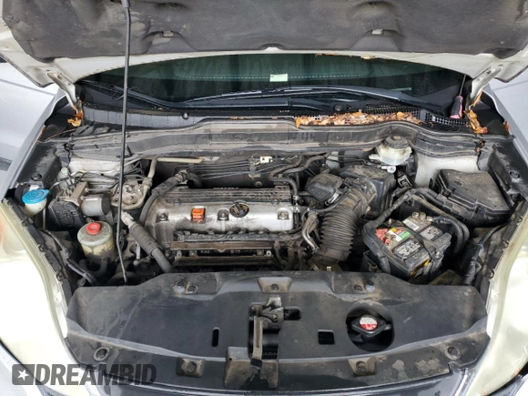 2010 Honda CR-V LX with VIN 5J6RE3H31AL033771, listed as a Copart auction lot 59527085 with 211,765 mi miles and Salvage title. Bid and sale history available at DreamBid. Image 12.