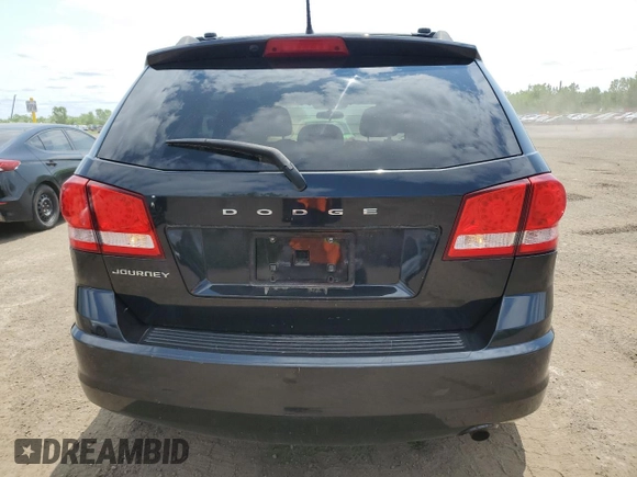 2013 Dodge Journey SE with VIN 3C4PDCAB0DT500365, listed as a Copart auction lot 61033665 with 193,231 mi miles and Salvage title. Bid and sale history available at DreamBid. Image 6.