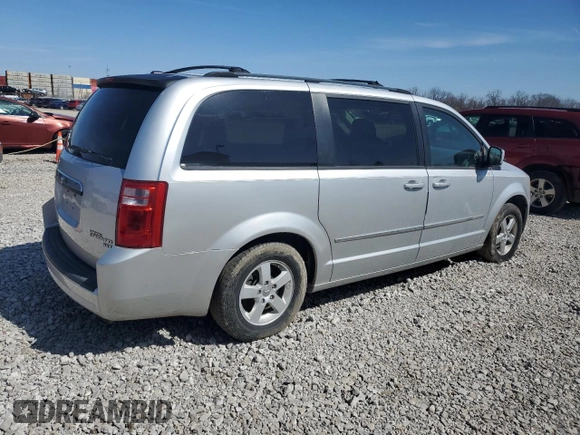 2010 Dodge Grand Caravan SXT with VIN 2D4RN5D17AR307328, listed as a Copart auction lot 49983425 with Not Provided miles and Clean Title. Bid and sale history available at DreamBid. Image 3.