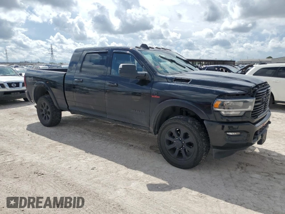 2020 Ram 2500 Laramie with VIN 3C6UR5NL1LG249759, listed as a Copart auction lot 68005064 with 137,130 mi miles and Salvage Title. Bid and sale history available at carsss.com. Image 4.