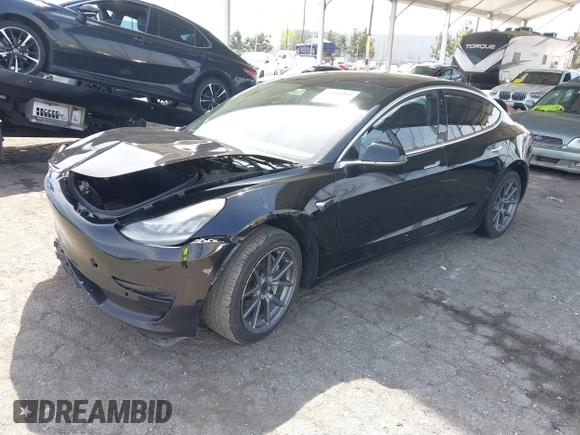2019 Tesla Model 3 Mid Range with VIN 5YJ3E1EA1KF410297, listed as a IAAI auction lot 41841991 with 176,254 mi miles. Bid and sale history available at carsss.com. Image 17.
