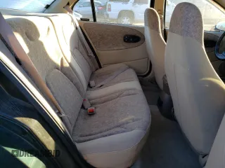 1997 Saturn SL z VIN 1G8ZH5285VZ122690, wystawiony jako Copart lot #81655244 z przebiegiem 159 048 mil mil oraz Szkoda całkowita • Salvage title. Historia ofert i sprzedaży dostępna na DreamBid. Obrazek 10.