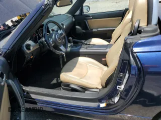 2010 Mazda MX-5 Miata Grand Touring with VIN JM1NC2FF9A0208674, listed as a Copart auction lot 63429065 with 166,294 mi miles and Clean title. Bid and sale history available at DreamBid. Image 7.