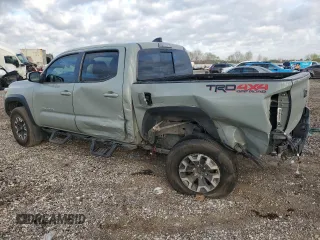 2023 Toyota Tacoma 4WD SR with VIN 3TMCZ5AN0PM625550, listed as a Copart auction lot 48675375 with 52,678 mi miles and Salvage Title. Bid and sale history available at carsss.com. Image 2.