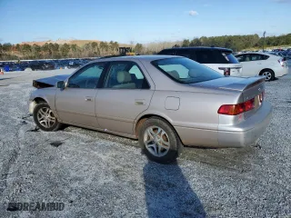 2000 Toyota Camry CE with VIN 4T1BG22K8YU704719, listed as a Copart auction lot 48874085 with 151,439 mi miles and Salvage Title. Bid and sale history available at carsss.com. Image 2.