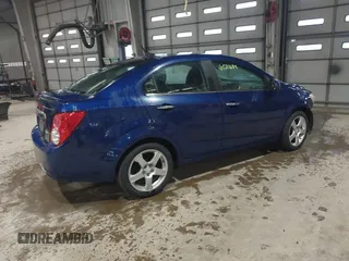 2014 Chevrolet Sonic LTZ with VIN 1G1JE5SB5E4226187, listed as a IAAI auction lot 41521689 with 73,325 mi miles. Bid and sale history available at carsss.com. Image 4.