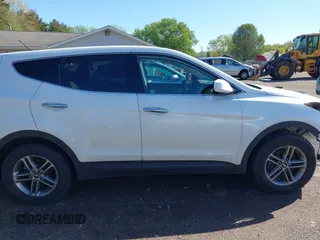 2018 Hyundai Santa Fe 2.4L z VIN 5NMZTDLB3JH090748, wystawiony jako IAAI lot #42145245 z przebiegiem 112 314 mil mil oraz . Historia ofert i sprzedaży dostępna na DreamBid. Obrazek 14.
